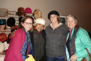 Natisha Amour [in the white hat] with happy customers.